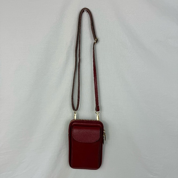 Deep red leather crossbody Uno Alla Volta mini bag with zipper and pockets. - Picture 1 of 16